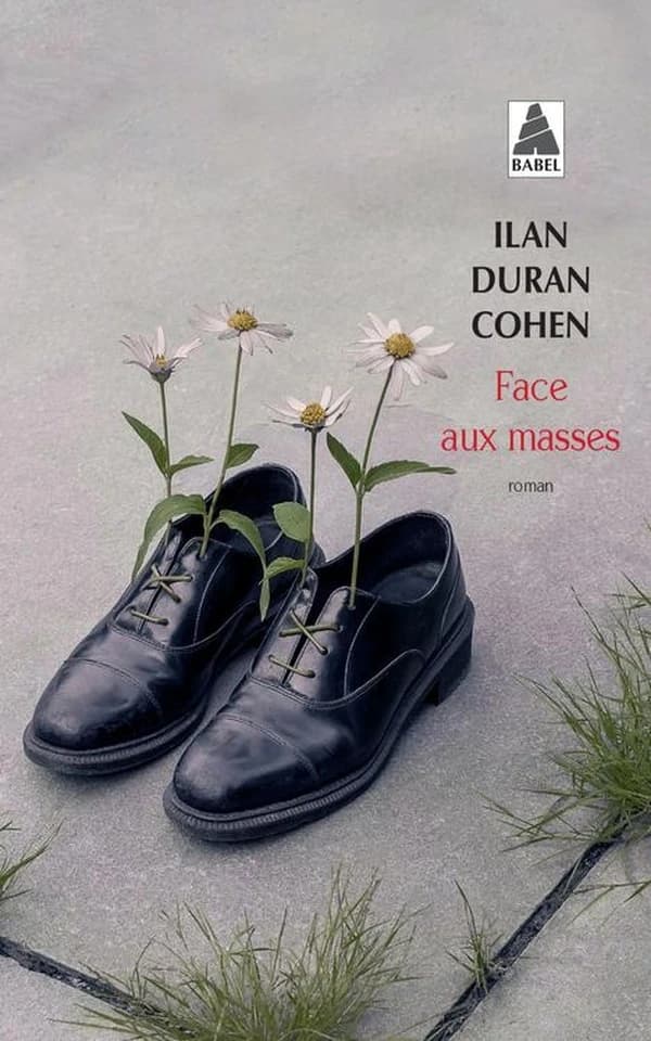 Face aux masses : roman