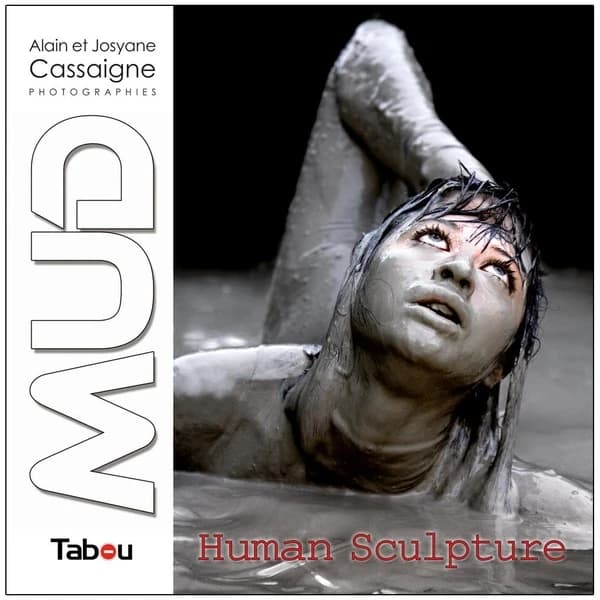 Mud : human sculpture : woman performance photography in mud