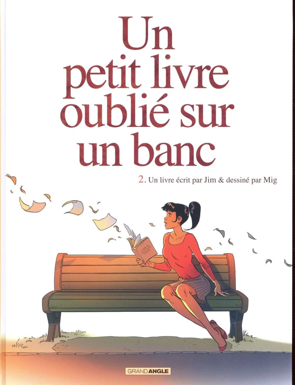 Un petit livre oublié sur un banc