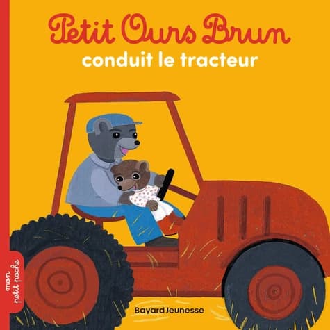 Petit Ours brun conduit le tracteur