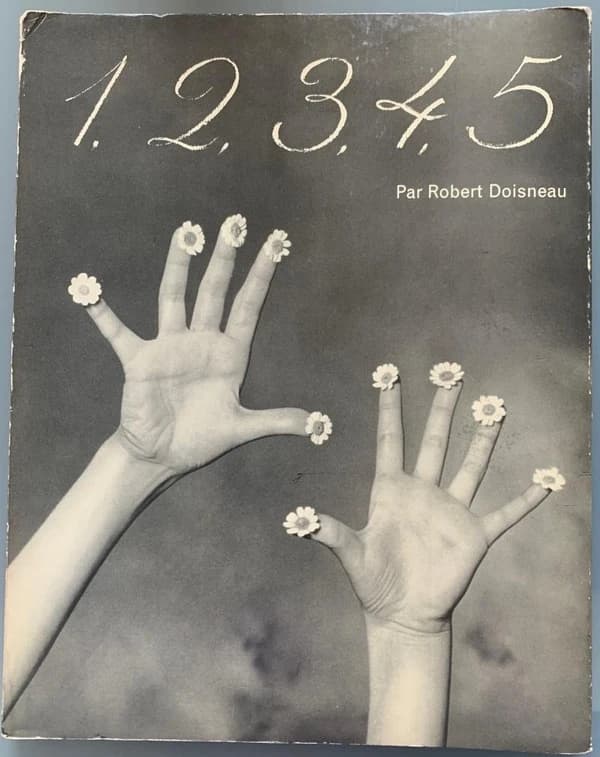 1, 2, 3, 4, 5 : compter en s'amusant ([Nouvelle éd.]) par Robert Doisneau ; [texte, Albert Plécy]