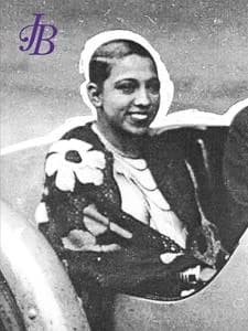 J B
